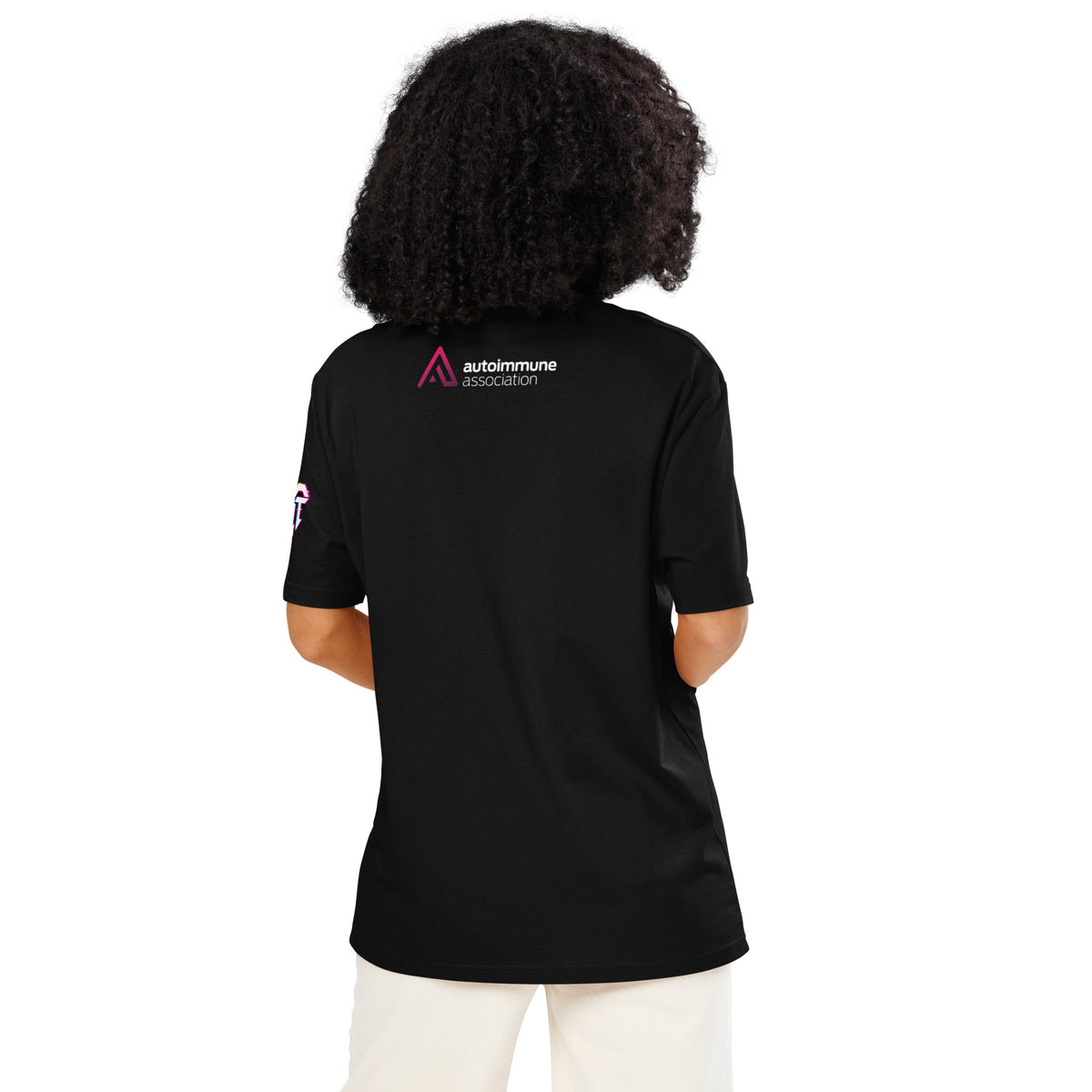 Black organic cotton tee, back view — Invisible Not Imagined awareness tee